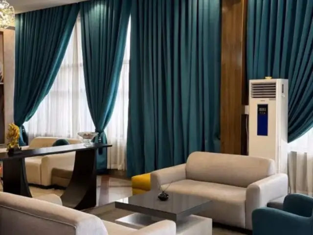 Teal velvet curtains in a hotel lounge